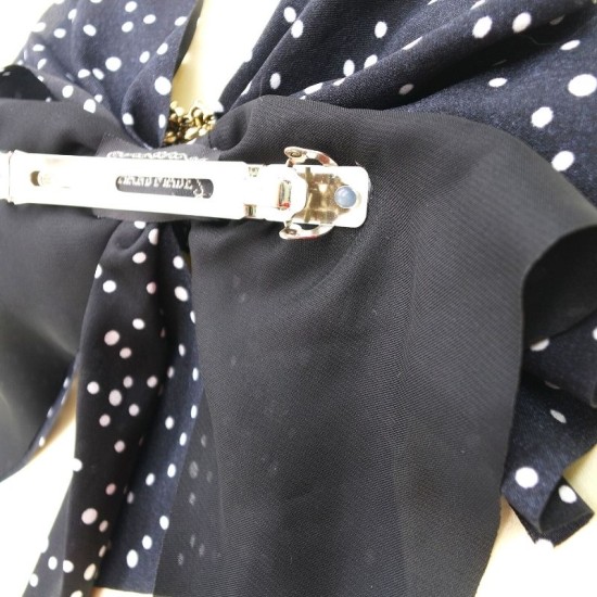 big polka dot black bow hairpin